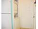 Compact laundry closet with stacked washer and dryer at 4201 N 20Th St # 205, Phoenix, AZ 85016