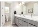 Double vanity bathroom with modern gray cabinets at 4415 N Sidney St, Buckeye, AZ 85396