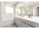 Spa-like bathroom with double vanity and soaking tub at 4415 N Sidney St, Buckeye, AZ 85396