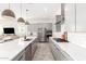 Sleek kitchen featuring stainless steel appliances and white cabinetry at 4415 N Sidney St, Buckeye, AZ 85396