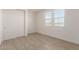 Spacious bedroom with tile floors and large windows at 4806 S 110Th Ave, Tolleson, AZ 85353