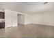 Spacious living room featuring tile floors and an open concept at 4806 S 110Th Ave, Tolleson, AZ 85353