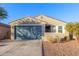 Curb appeal of a new construction home with a two-car garage at 5644 W Jackalope Ln, Laveen, AZ 85339