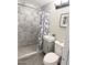 Updated bathroom with a shower and pedestal sink at 6025 S 13Th St, Phoenix, AZ 85042