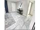 Modern entryway with tile flooring and a sleek console table at 6025 S 13Th St, Phoenix, AZ 85042