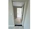 Clean hallway with tiled floor leading to other rooms at 6025 S 13Th St, Phoenix, AZ 85042