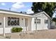 White single story home with covered entry and landscaping at 6732 E Culver St, Scottsdale, AZ 85257