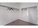 Large walk-in closet with double hanging rods at 6843 W Samantha Way, Laveen, AZ 85339