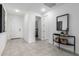 Bright entryway with tile floors and a modern console table at 6843 W Samantha Way, Laveen, AZ 85339