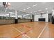 Indoor basketball court with hardwood floors and markings at 7117 E Rancho Vista Dr # 4005, Scottsdale, AZ 85251