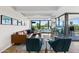 Modern living room with leather sofas and large windows at 7117 E Rancho Vista Dr # 4005, Scottsdale, AZ 85251