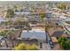 Aerial view of the house, backyard, and neighborhood at 7214 N 35Th Ave, Phoenix, AZ 85051