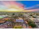 Aerial view showing the house and surrounding area at sunset at 7214 N 35Th Ave, Phoenix, AZ 85051