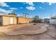 Backyard with sandbox, curved pathway, and play equipment at 7214 N 35Th Ave, Phoenix, AZ 85051