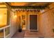 Inviting entryway with a dark wood door and a glimpse into the interior at 7301 E Claremont St, Scottsdale, AZ 85250