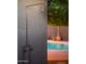 Rustic copper pool shower with a view of the pool at 7301 E Claremont St, Scottsdale, AZ 85250