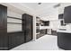 Spacious kitchen with ample dark cabinetry and a large island at 9025 N 86Th Pl, Scottsdale, AZ 85258