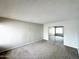 Spacious bedroom with mirrored closet doors and neutral carpeting at 9054 N 51St Ln, Glendale, AZ 85302