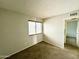 Cozy bedroom with window, neutral walls and carpeting at 9054 N 51St Ln, Glendale, AZ 85302