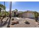 Single story home with desert landscaping and walkway at 9637 E Sundune Dr, Sun Lakes, AZ 85248