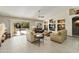 Bright living room featuring built-in shelving and a cozy atmosphere at 9637 E Sundune Dr, Sun Lakes, AZ 85248