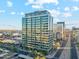 Aerial view of a modern high-rise building in a city setting at 1 E Lexington Ave # 701, Phoenix, AZ 85012