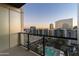 Private balcony overlooking pool and city skyline at 1 E Lexington Ave # 701, Phoenix, AZ 85012