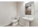 Clean bathroom with pedestal sink, toilet and shower at 1 E Lexington Ave # 701, Phoenix, AZ 85012