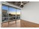 Bedroom with hardwood floors and city views at 1 E Lexington Ave # 701, Phoenix, AZ 85012