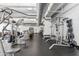 Modern gym with various weight and cardio equipment at 1 E Lexington Ave # 701, Phoenix, AZ 85012