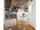 Modern kitchen with island and exposed ductwork at 1 E Lexington Ave # 701, Phoenix, AZ 85012