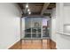 Bright living room with hardwood floors and city view at 1 E Lexington Ave # 701, Phoenix, AZ 85012