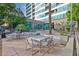 Outdoor patio area with seating and grilling station at 1 E Lexington Ave # 701, Phoenix, AZ 85012