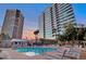 Resort-style pool with city views and lounge chairs at 1 E Lexington Ave # 701, Phoenix, AZ 85012