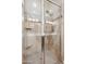 Large walk-in shower with glass enclosure and tile surround at 10055 N 142Nd St # 1310, Scottsdale, AZ 85259