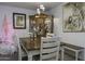 Charming dining room with wooden table and chairs at 10178 W San Lazaro Dr, Arizona City, AZ 85123