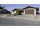 House exterior showcasing a brown garage door and desert landscaping at 10178 W San Lazaro Dr, Arizona City, AZ 85123