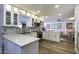 Modern white kitchen with quartz countertops and stainless steel appliances at 10178 W San Lazaro Dr, Arizona City, AZ 85123