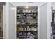 Well-organized pantry with ample shelving for storage at 10178 W San Lazaro Dr, Arizona City, AZ 85123