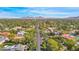 Aerial view of a residential neighborhood showcasing tree-lined streets and mountain views at 102 W Maryland Ave # B2, Phoenix, AZ 85013