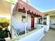 Inviting porch featuring seating area and awning, offering a cozy and shaded outdoor space at 102 W Maryland Ave # B2, Phoenix, AZ 85013