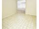 Empty spare room with tiled floors and a window with blinds at 102 W Maryland Ave # B2, Phoenix, AZ 85013