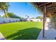 Artificial turf backyard with pergola and brick at 11252 N 37Th St, Phoenix, AZ 85028