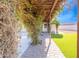 Brick pathway leads to a pergola-covered patio at 11252 N 37Th St, Phoenix, AZ 85028