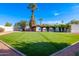 Expansive backyard with artificial turf and pergola at 11252 N 37Th St, Phoenix, AZ 85028