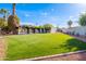 Large backyard with lush artificial turf at 11252 N 37Th St, Phoenix, AZ 85028