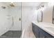 Elegant bathroom with double vanity, large shower, and marble tile at 11252 N 37Th St, Phoenix, AZ 85028