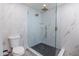 Modern bathroom featuring a walk-in shower and hexagon tile flooring at 11252 N 37Th St, Phoenix, AZ 85028