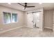 Bedroom with ensuite bathroom and sliding barn door at 11252 N 37Th St, Phoenix, AZ 85028