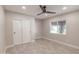 Bright bedroom with wood-look floors and ample closet space at 11252 N 37Th St, Phoenix, AZ 85028